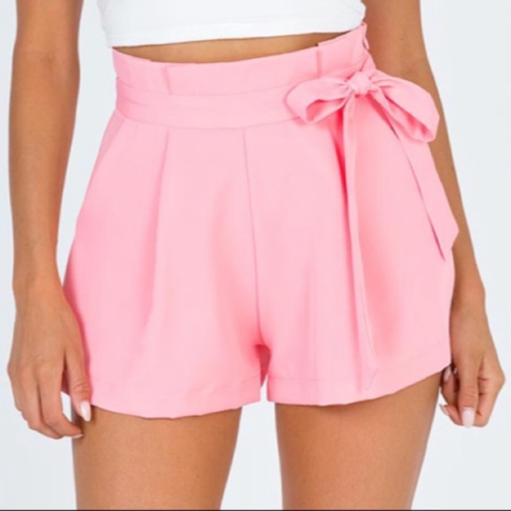 Princess Polly high waisted pink shorts